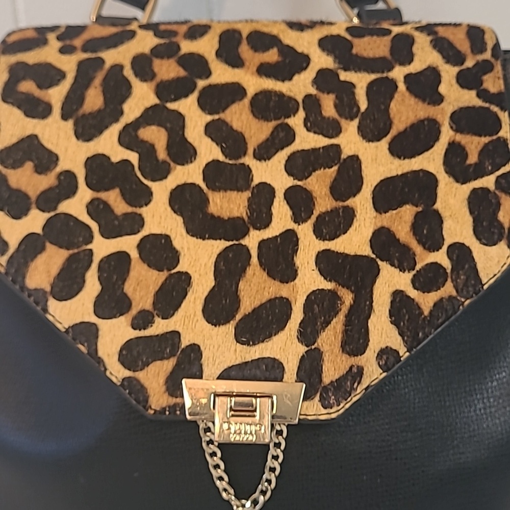 Dune London Calf Hair Leopard Flap / Black Leather Backpack Adjustable Straps - Picture 2 of 13